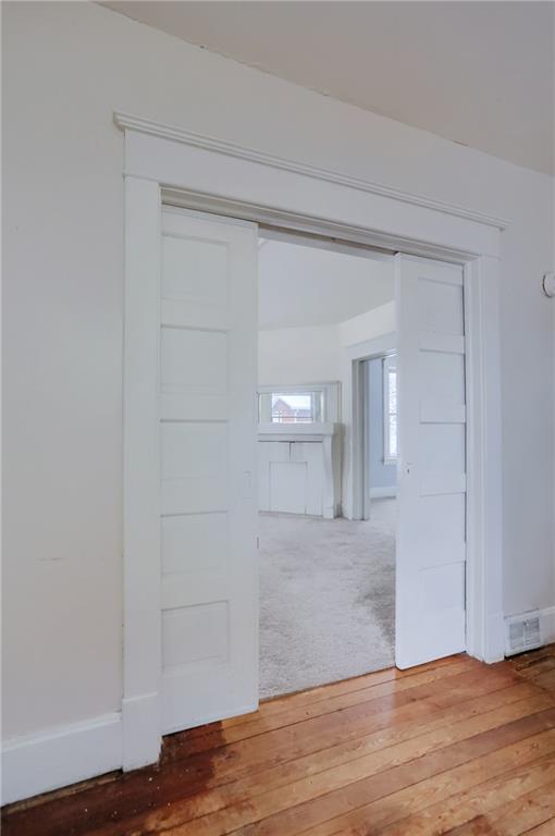 403 Federal Street Butler, PA 16001 - Photo 8 of 46 Craftsman wood detailing complements the pocket doors and home.