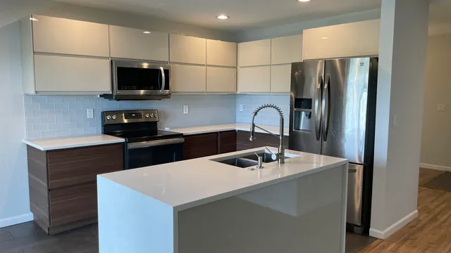 wooden floor in an empty room with a mirror