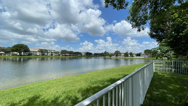 a view of a lake with a city from a lake