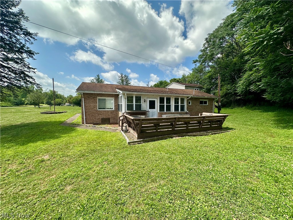 28 Richter Road Colliers, WV 26035 - Photo 22 of 38 Back of home featuring deck