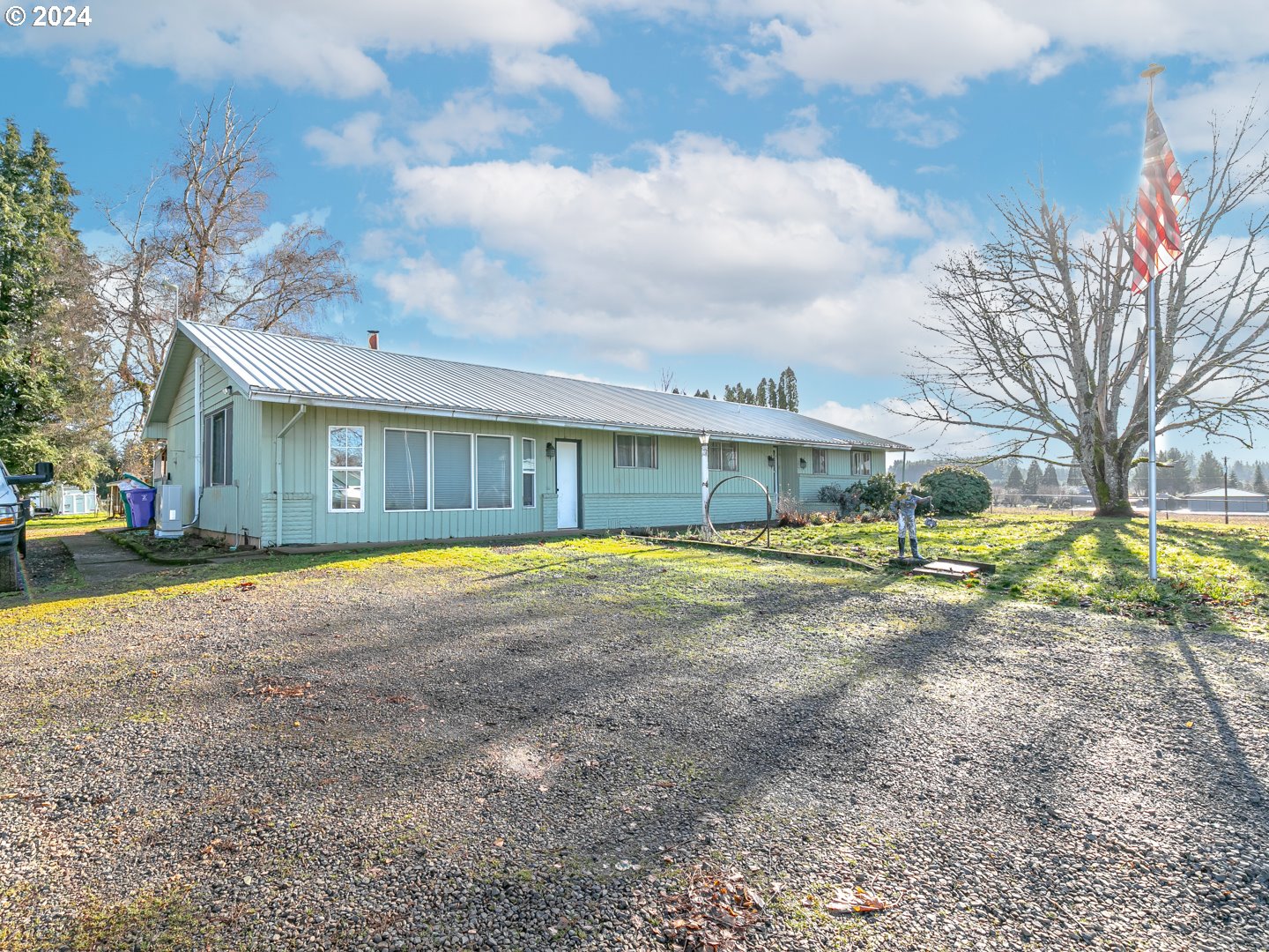 24502 South Springwater Road Estacada, OR 97023 - Photo 3 of 48 a view of house with yard and sitting area