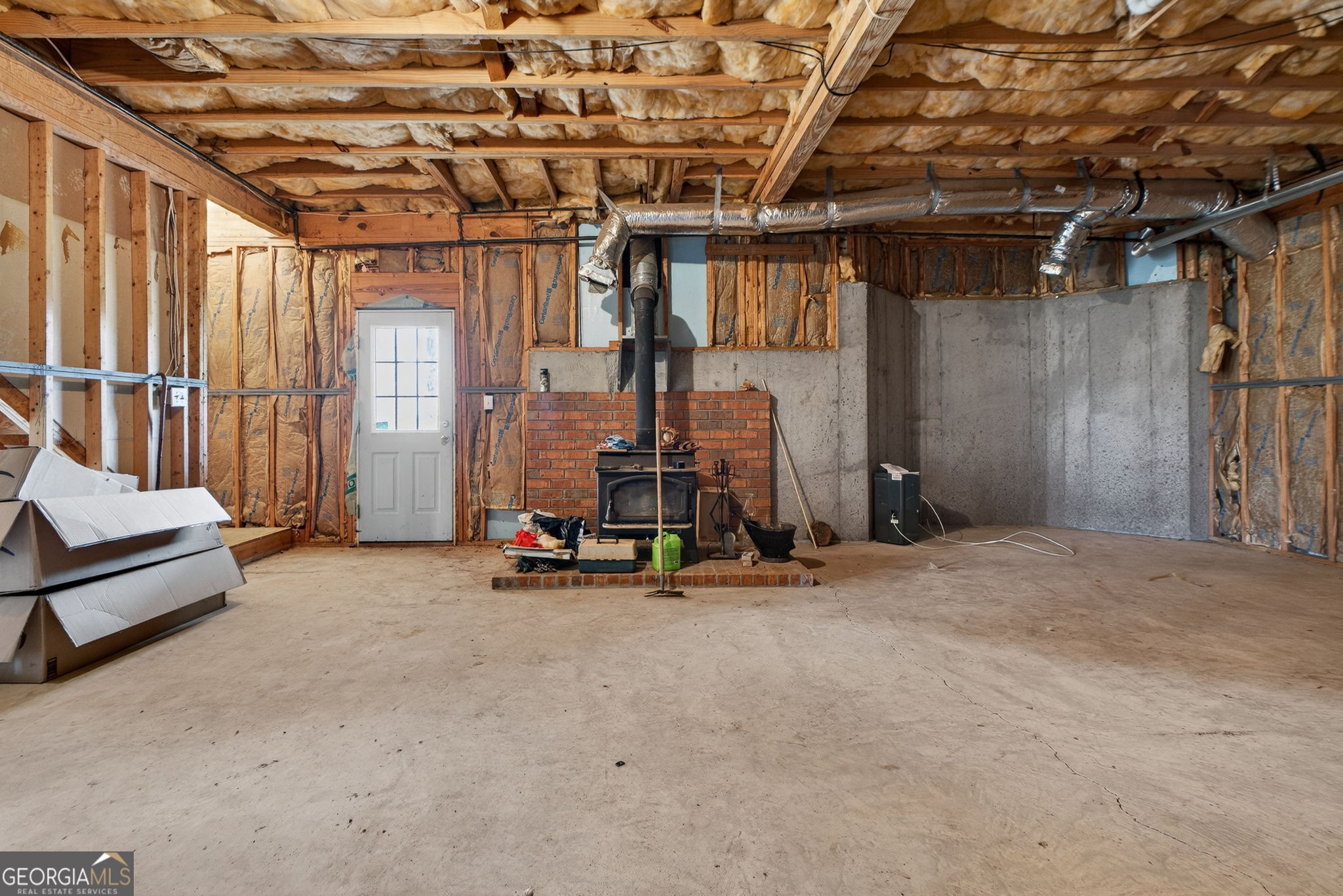 955 Mocassin Gap Road Locust Grove, GA 30248 - Photo 38 of 59 a view of a room with gym equipment
