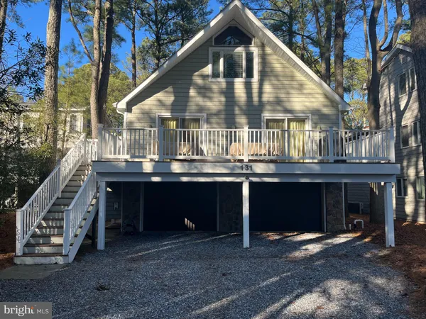 a front view of a house with a balcony