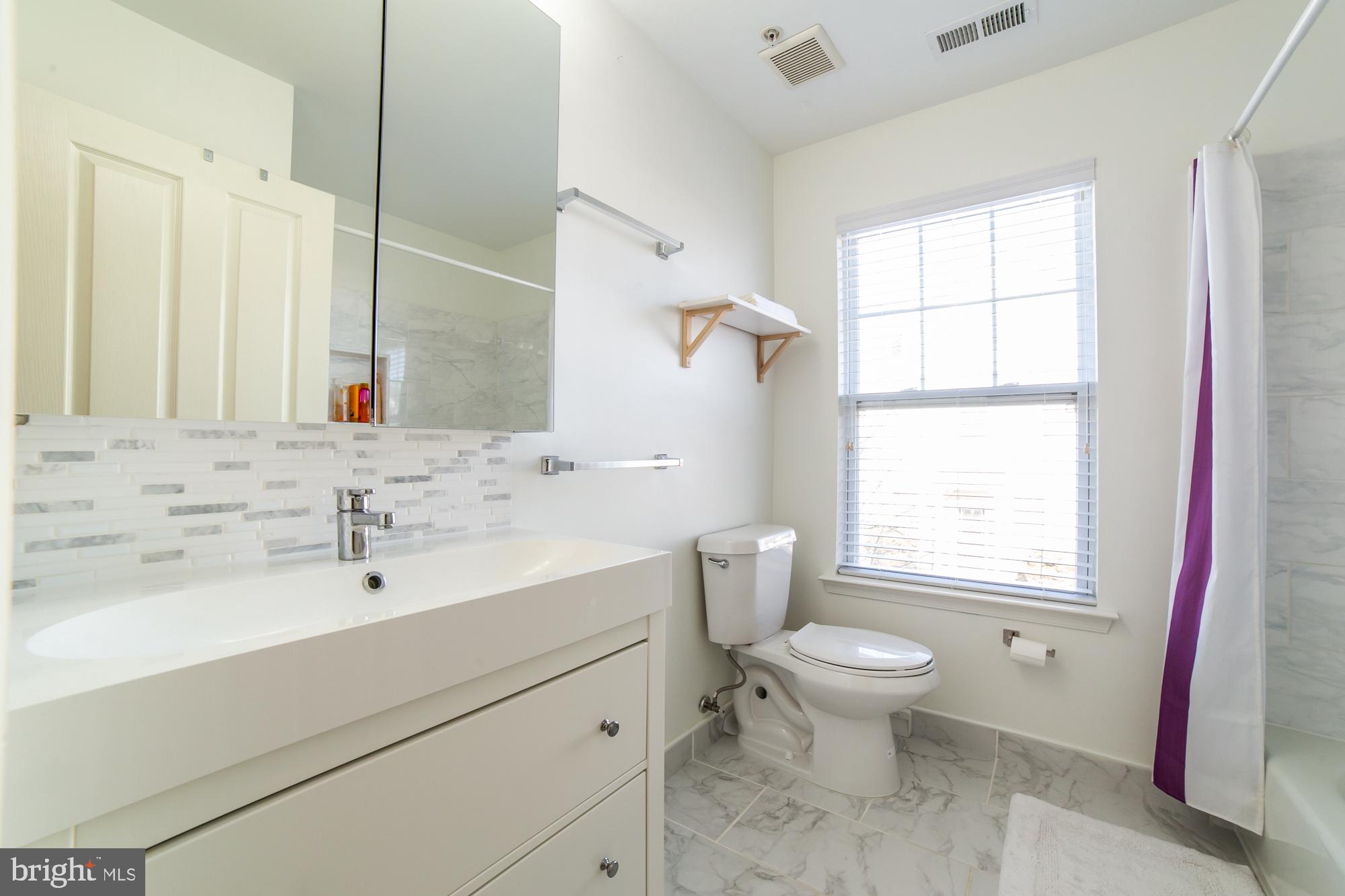 22 Old Cedarbrook Road Wyncote, PA 19095 - Photo 14 of 18 Hall Bathroom