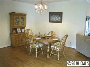 1728 Beamguard Road Clover, SC 29710 - Photo 4 of 8 a view of a dining room with furniture and chandelier