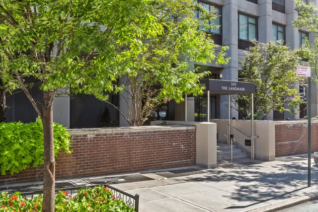 a view of a house with a tree