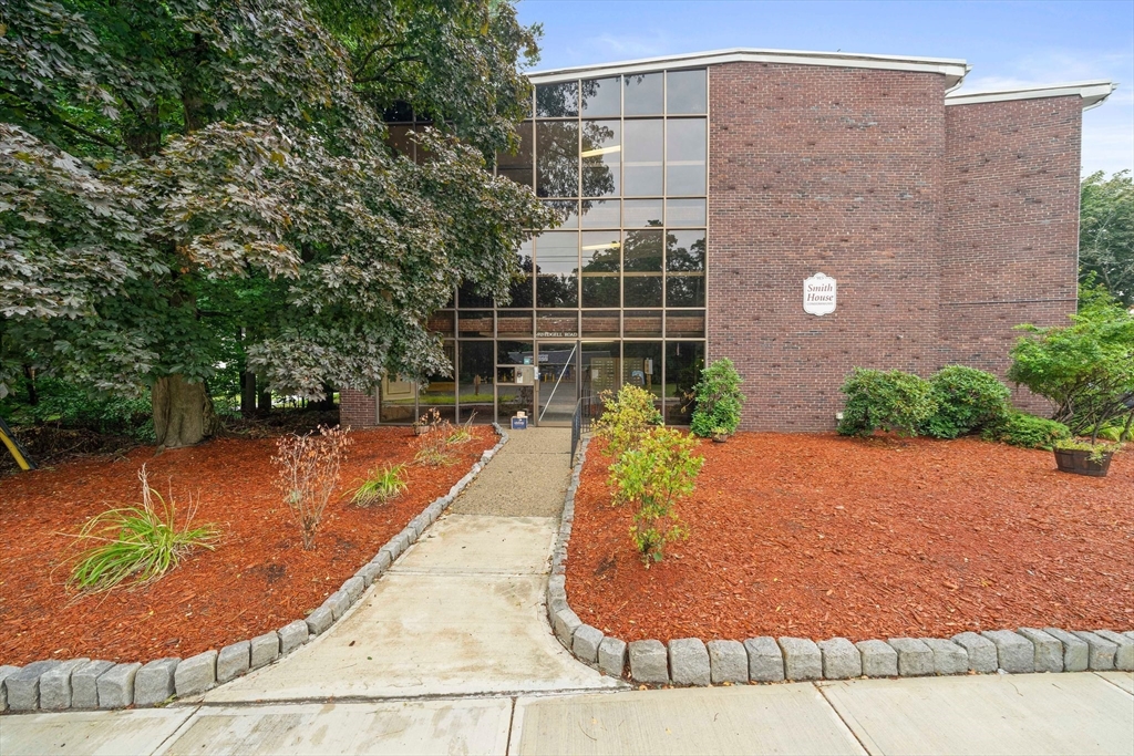 915 Edgell Road, Unit 77 Framingham, MA 01701 - Photo 1 of 15 a view of a backyard