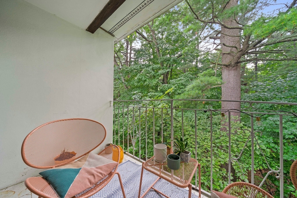 915 Edgell Road, Unit 77 Framingham, MA 01701 - Photo 14 of 15 a outdoor view with a seating space