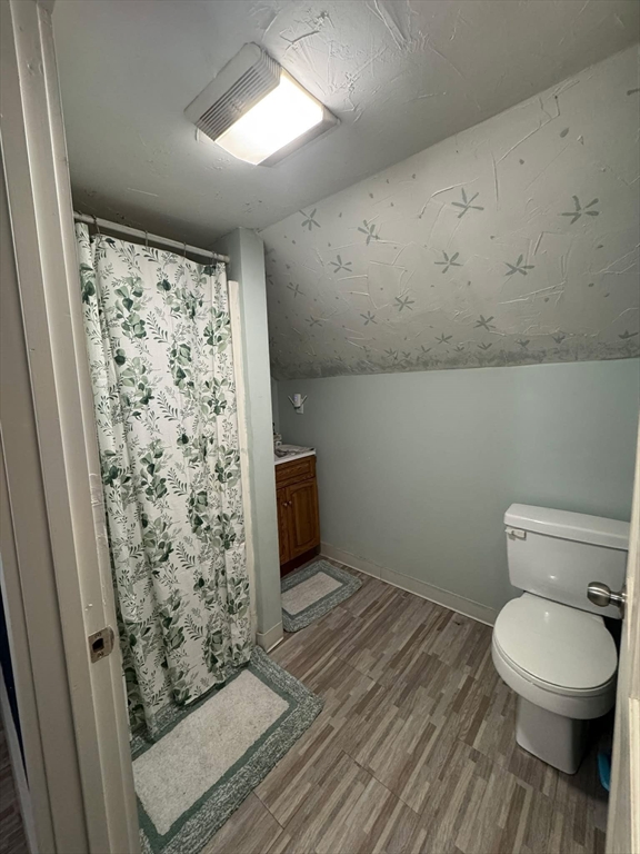 8 Water Street Greenfield, MA 01301 - Photo 18 of 21 a bathroom with a toilet and a shower