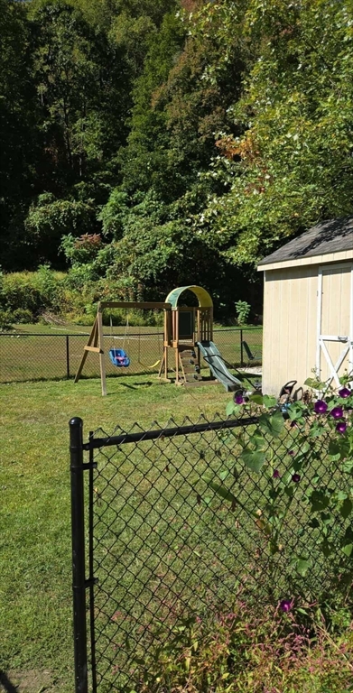 8 Water Street Greenfield, MA 01301 - Photo 19 of 21 a view of a chairs and table on the river