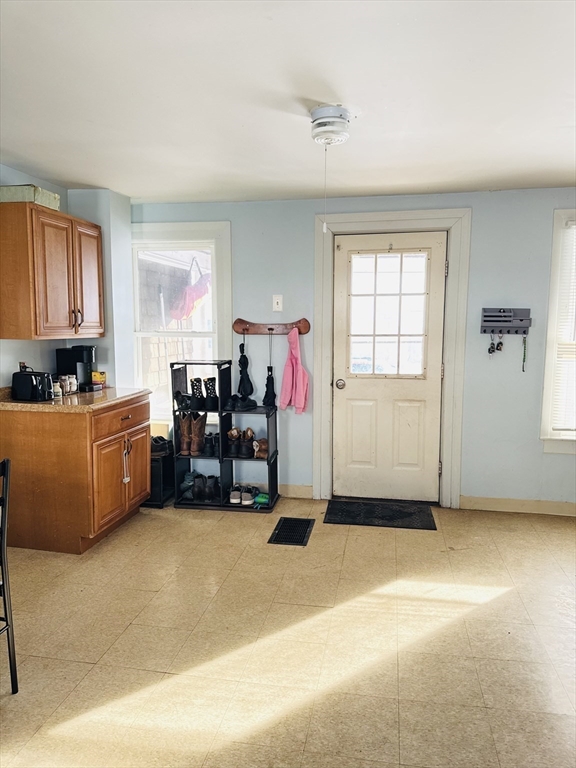 8 Water Street Greenfield, MA 01301 - Photo 5 of 21 a view of livingroom with workspace and windows