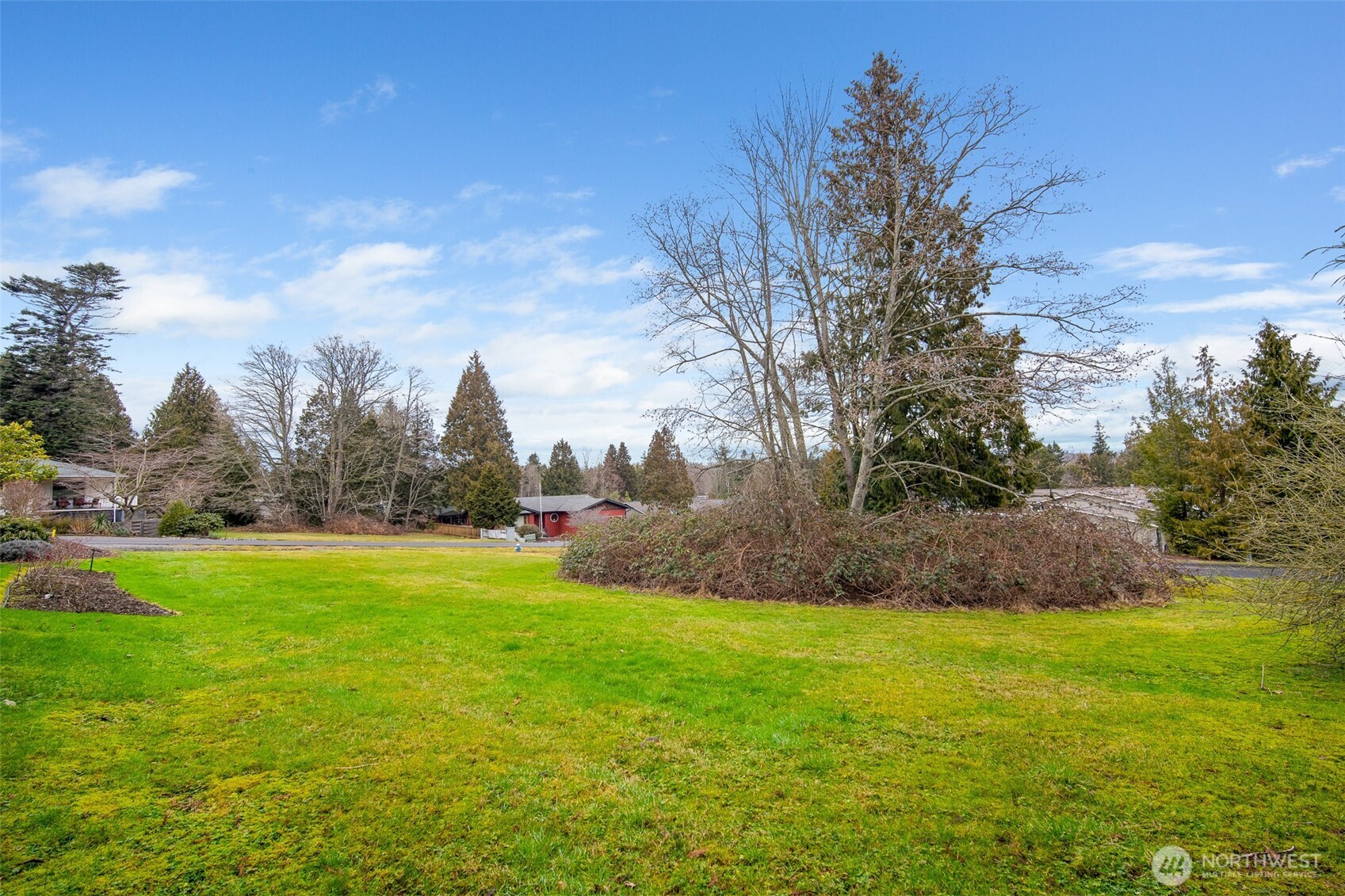 0 Quinault Road Blaine, WA 98230 - Photo 12 of 15 a view of a field of grass and trees
