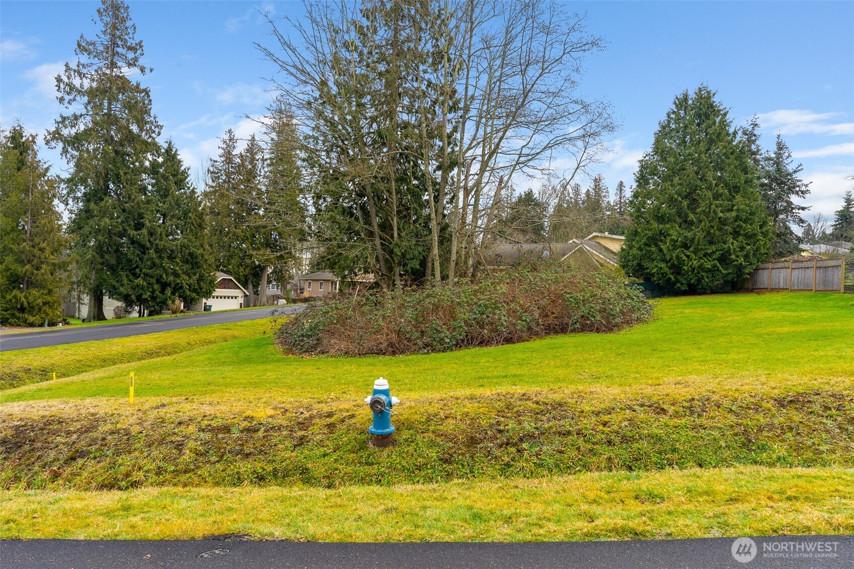 0 Quinault Road Blaine, WA 98230 - Photo 15 of 15 a view of a swimming pool with an outdoor space and seating area