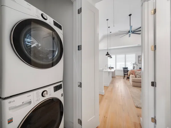 a view of a kitchen with washer and dryer