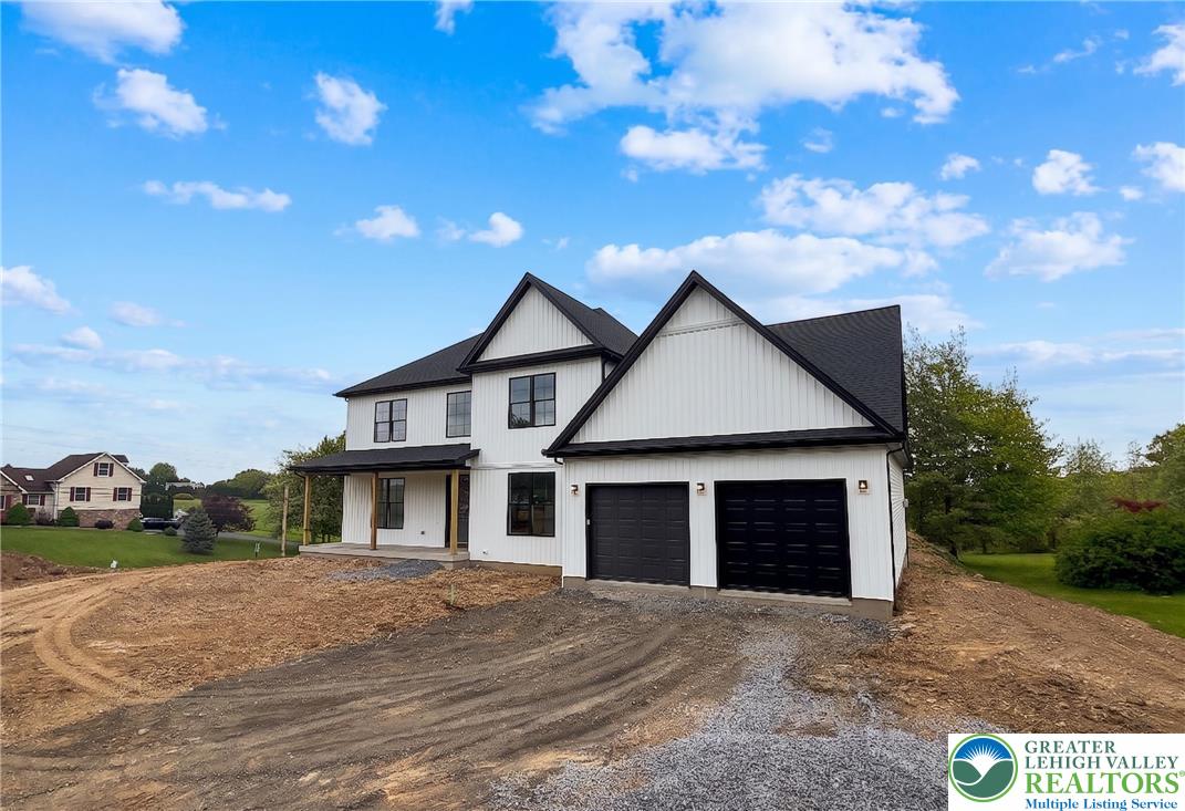 1899 Kecks Road Breinigsville, PA 18031 - Photo 1 of 30 This modern farmhouse style residence features a clean exterior and a welcoming facade.