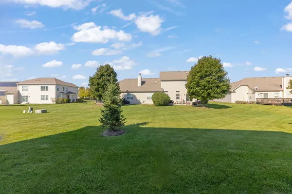 a view of a house with a big yard