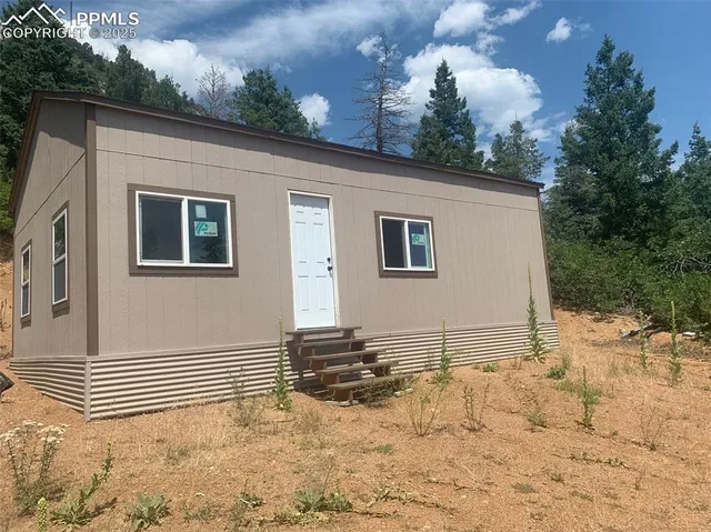 a view of a house with a snow