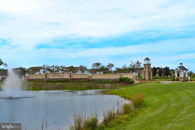 an aerial view of a house with a garden
