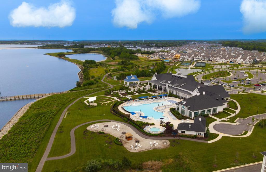 190 Harrier Way, Unit 11 Chester, MD 21619 - Photo 30 of 32 a view of a swimming pool with lounge chair