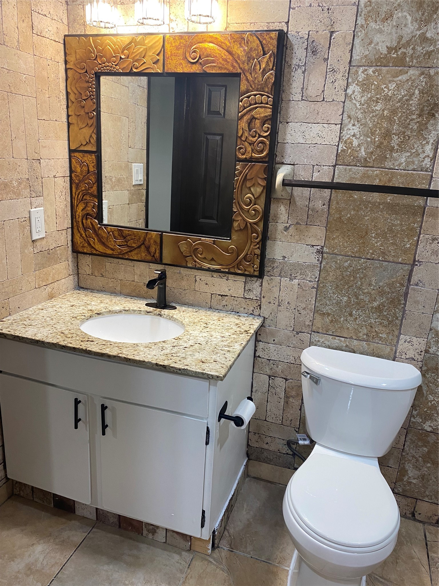 3107 Raccoon Run Spring, TX 77373 - Photo 14 of 35 Master bathroom with new faucet and vanity lights
