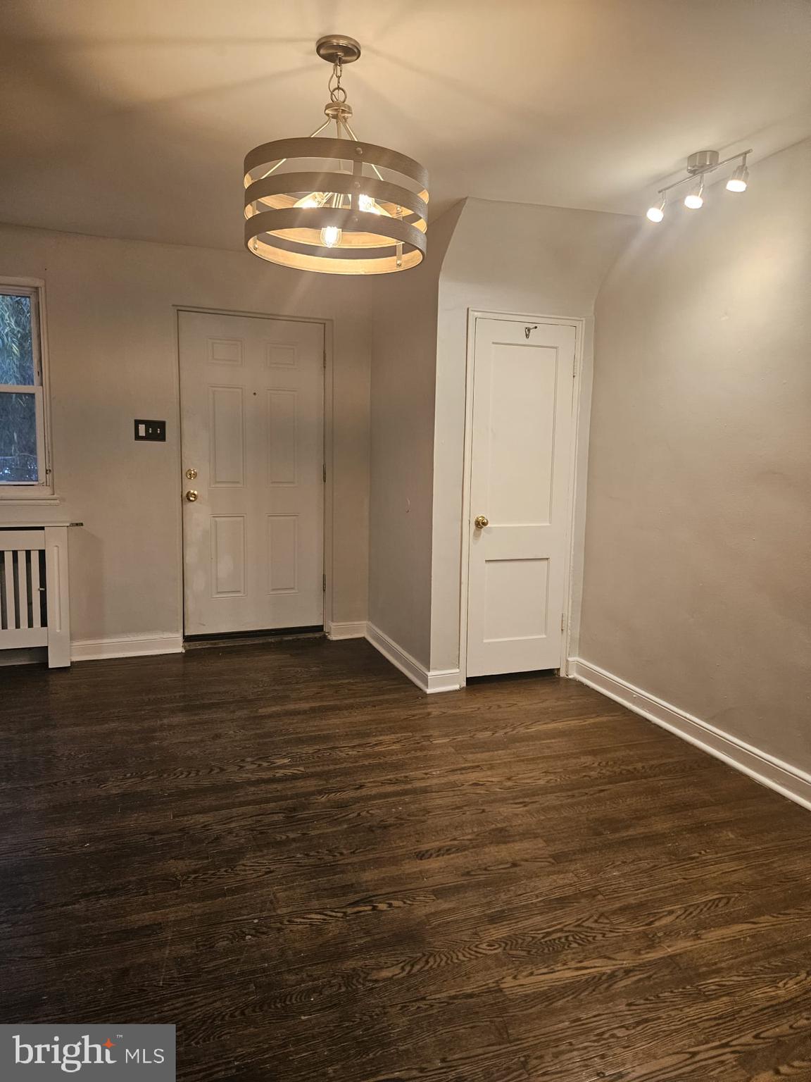 6312 North 10th Street, Unit 1 Philadelphia, PA 19141 - Photo 2 of 8 a view of a livingroom with wooden floor