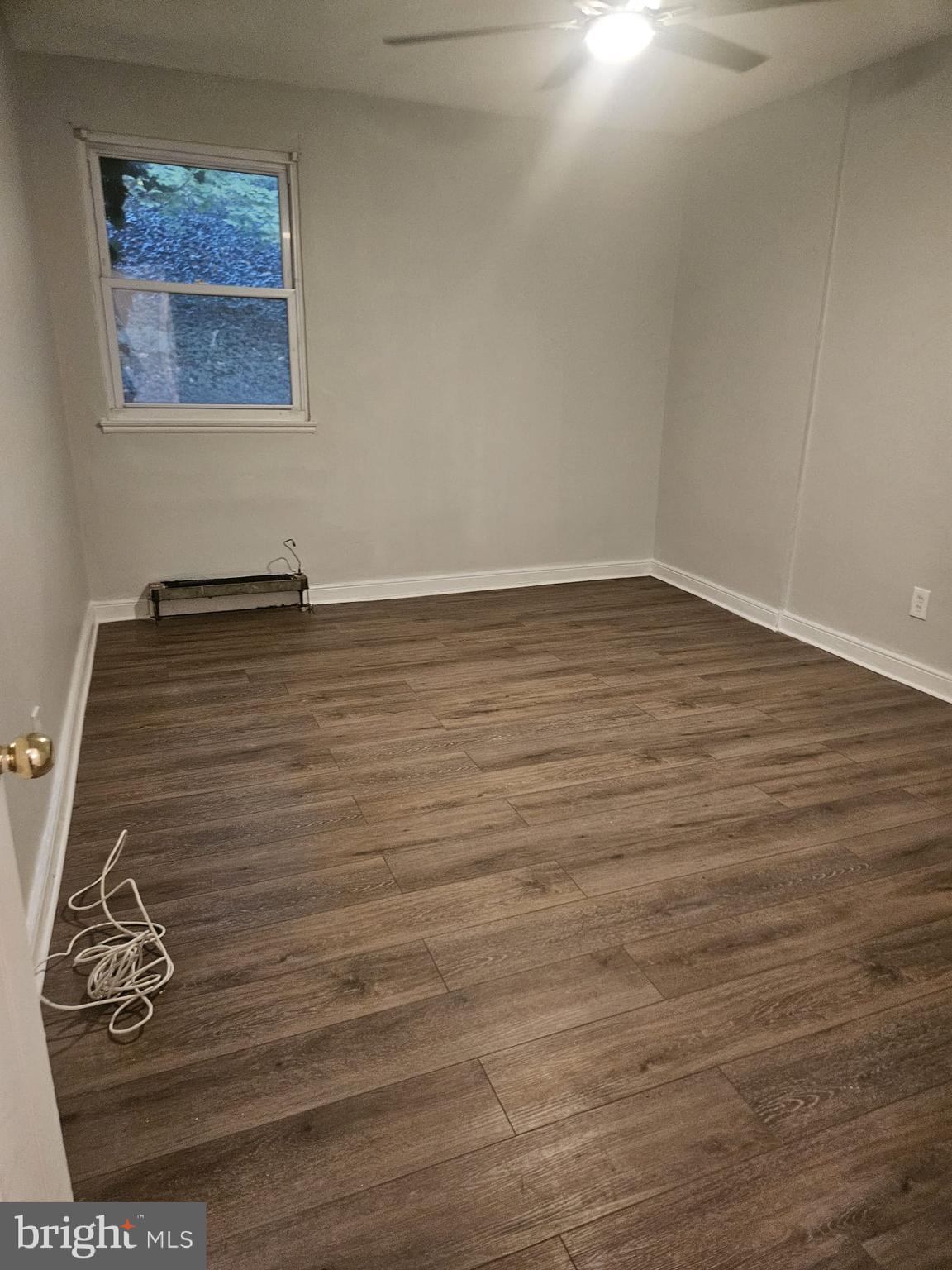 6312 North 10th Street, Unit 1 Philadelphia, PA 19141 - Photo 6 of 8 a view of a room with wooden floor