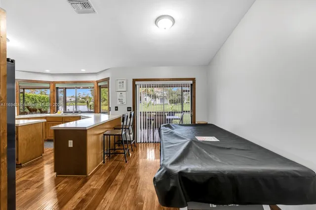 a bathroom with a toilet a sink and a mirror