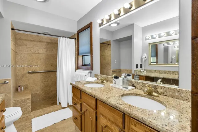 a view of swimming pool with seating space