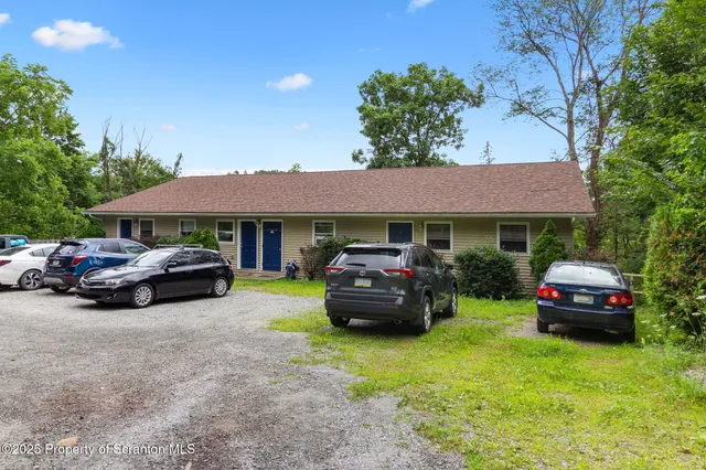 a car parked in front of a house