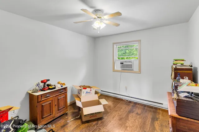 a bathroom with a sink toilet and vanity