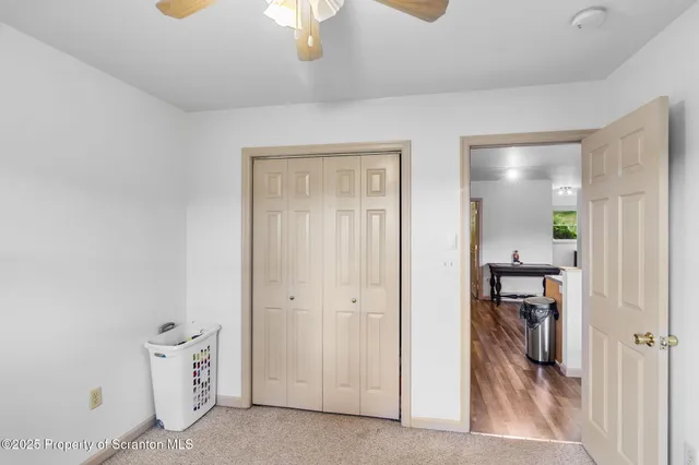 a kitchen with a stove a sink and a refrigerator