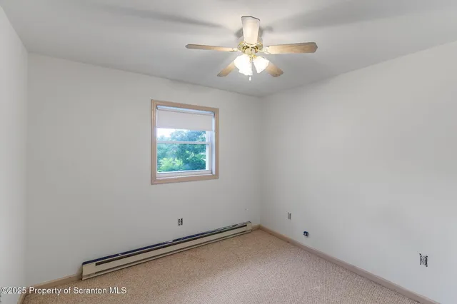 a bed room with a bed furniture and a window