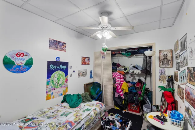 a bedroom with furniture and a bed