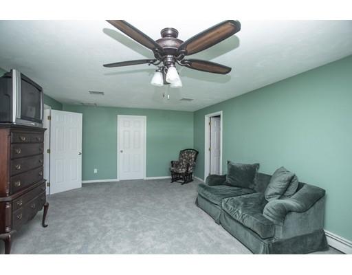 6 Wallace Drive Berkley, MA 02779 - Photo 25 of 30 a living room with furniture and a ceiling fan