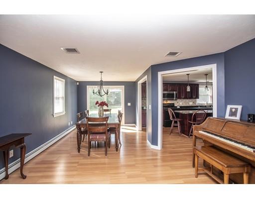 6 Wallace Drive Berkley, MA 02779 - Photo 7 of 30 a dining room with furniture a rug and wooden floor