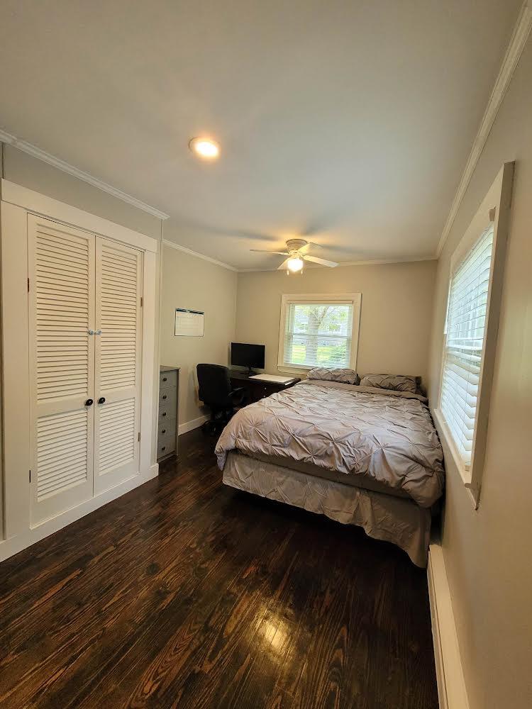 52 Ploughed Neck Road East Sandwich, MA 02537 - Photo 17 of 20 a bedroom with a bed and wooden floor