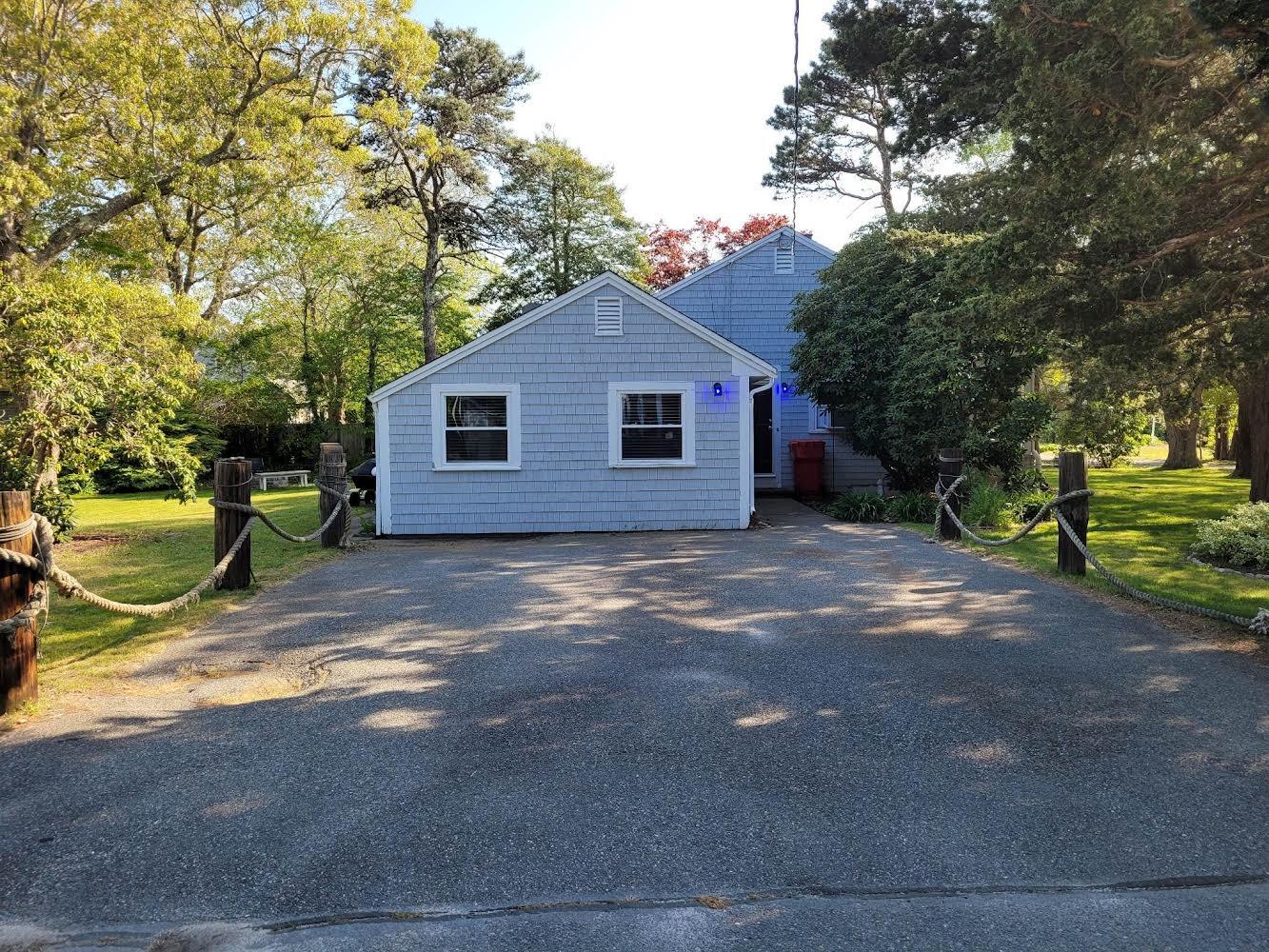 52 Ploughed Neck Road East Sandwich, MA 02537 - Photo 4 of 20 a view of backyard of house
