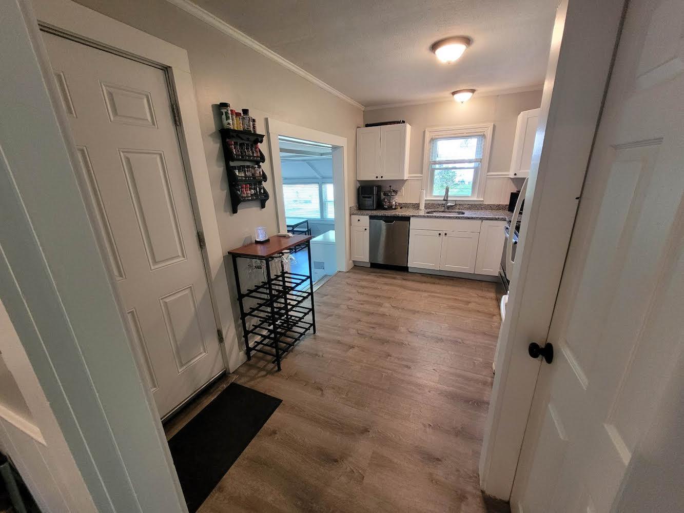 52 Ploughed Neck Road East Sandwich, MA 02537 - Photo 9 of 20 a view of living room with wooden floor and electronic appliances