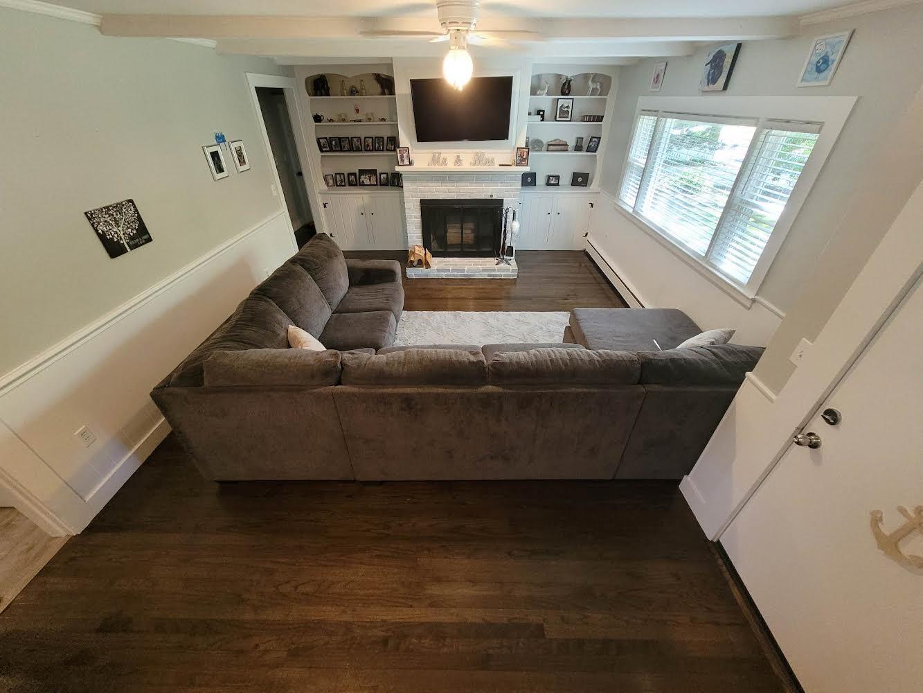 52 Ploughed Neck Road East Sandwich, MA 02537 - Photo 10 of 20 a living room with furniture and a fireplace