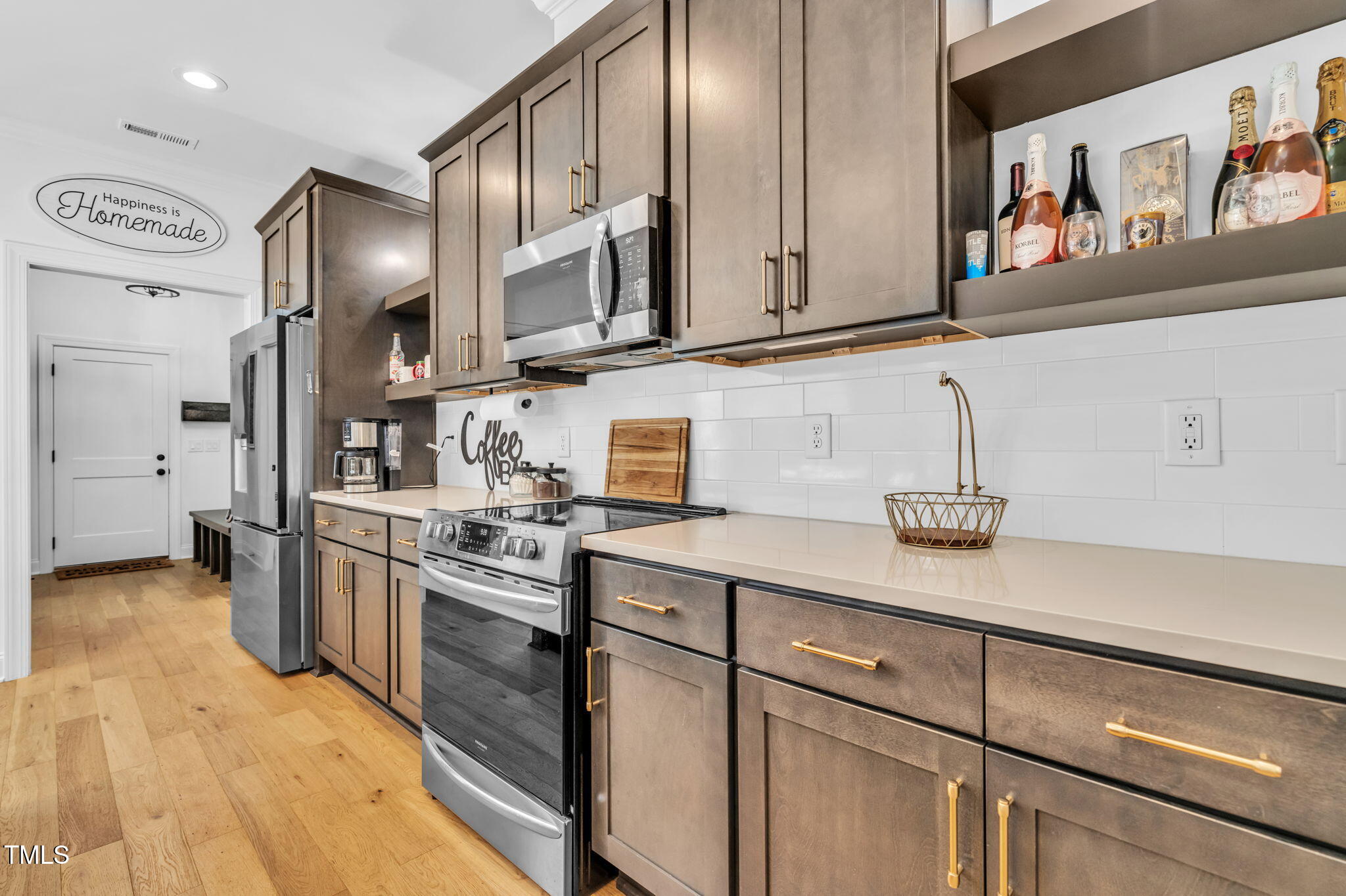 45 Tamaran Ct Spring Spring Hope, NC 27882 - Photo 10 of 35 a kitchen with stainless steel appliances granite countertop a sink and a stove