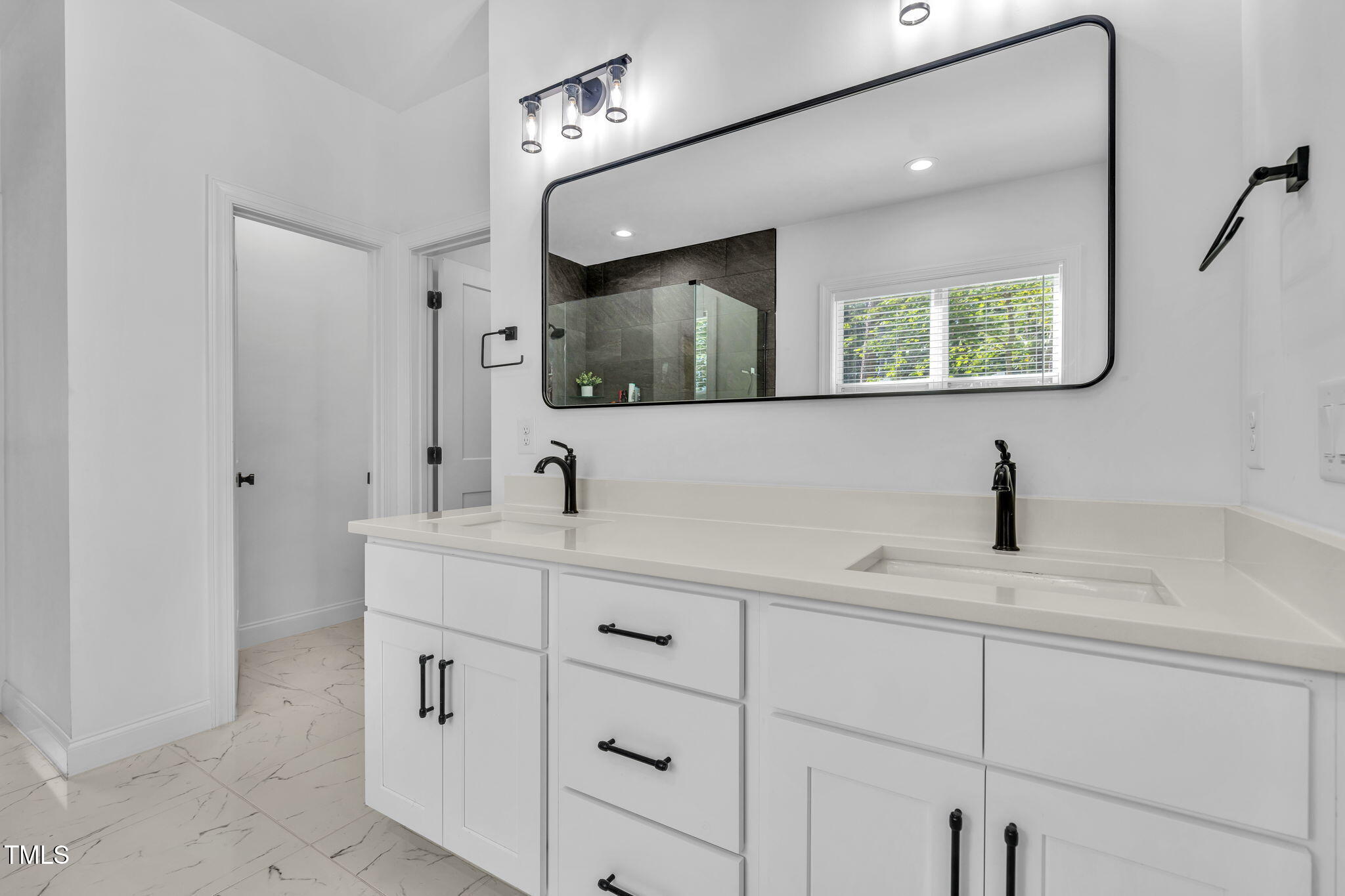 45 Tamaran Ct Spring Spring Hope, NC 27882 - Photo 15 of 35 a bathroom with a sink and a mirror