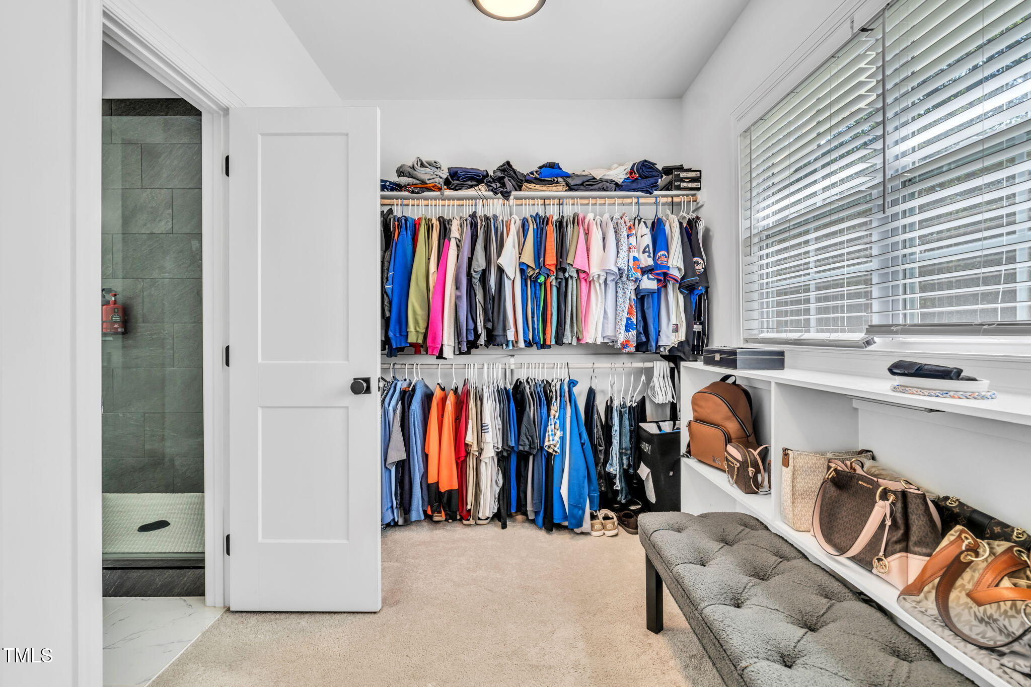 45 Tamaran Ct Spring Spring Hope, NC 27882 - Photo 19 of 35 a view of walk in closet with clothes and shoes