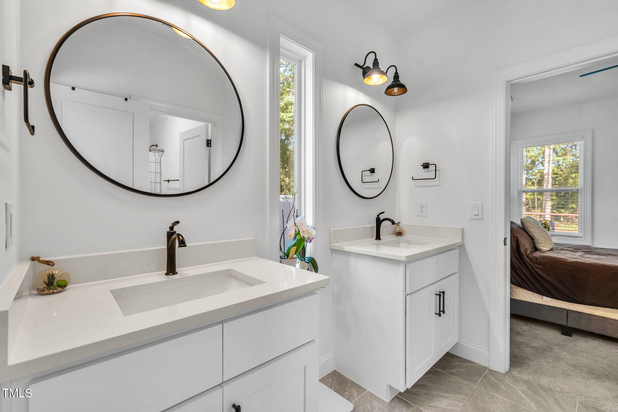 45 Tamaran Ct Spring Spring Hope, NC 27882 - Photo 22 of 35 a bathroom with a sink and a mirror