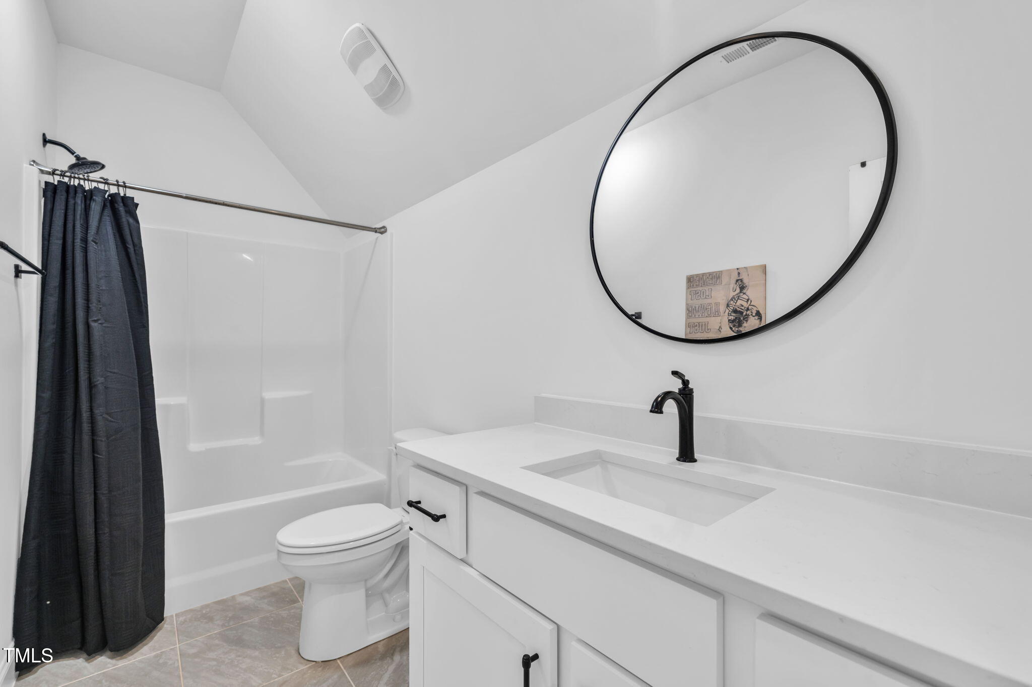 45 Tamaran Ct Spring Spring Hope, NC 27882 - Photo 26 of 35 a bathroom with a sink a toilet and a mirror