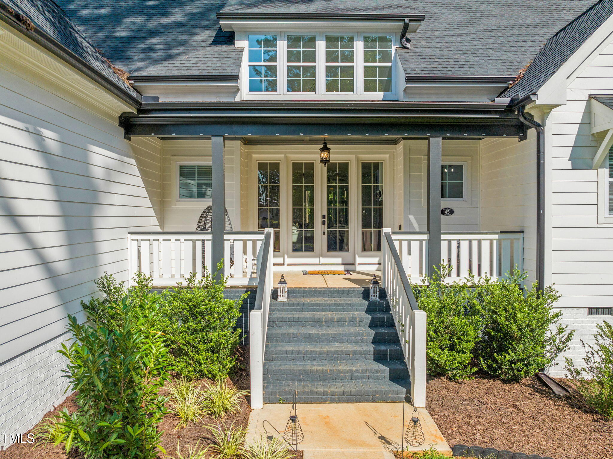 45 Tamaran Ct Spring Spring Hope, NC 27882 - Photo 3 of 35 a view of a house with entryway and flower plants