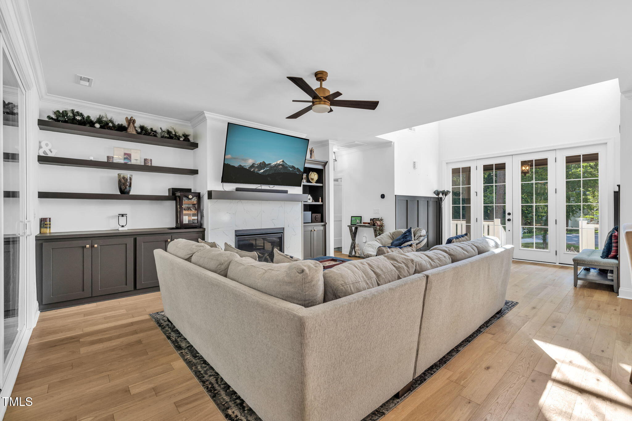 45 Tamaran Ct Spring Spring Hope, NC 27882 - Photo 5 of 35 a living room with furniture a flat screen tv and a fireplace