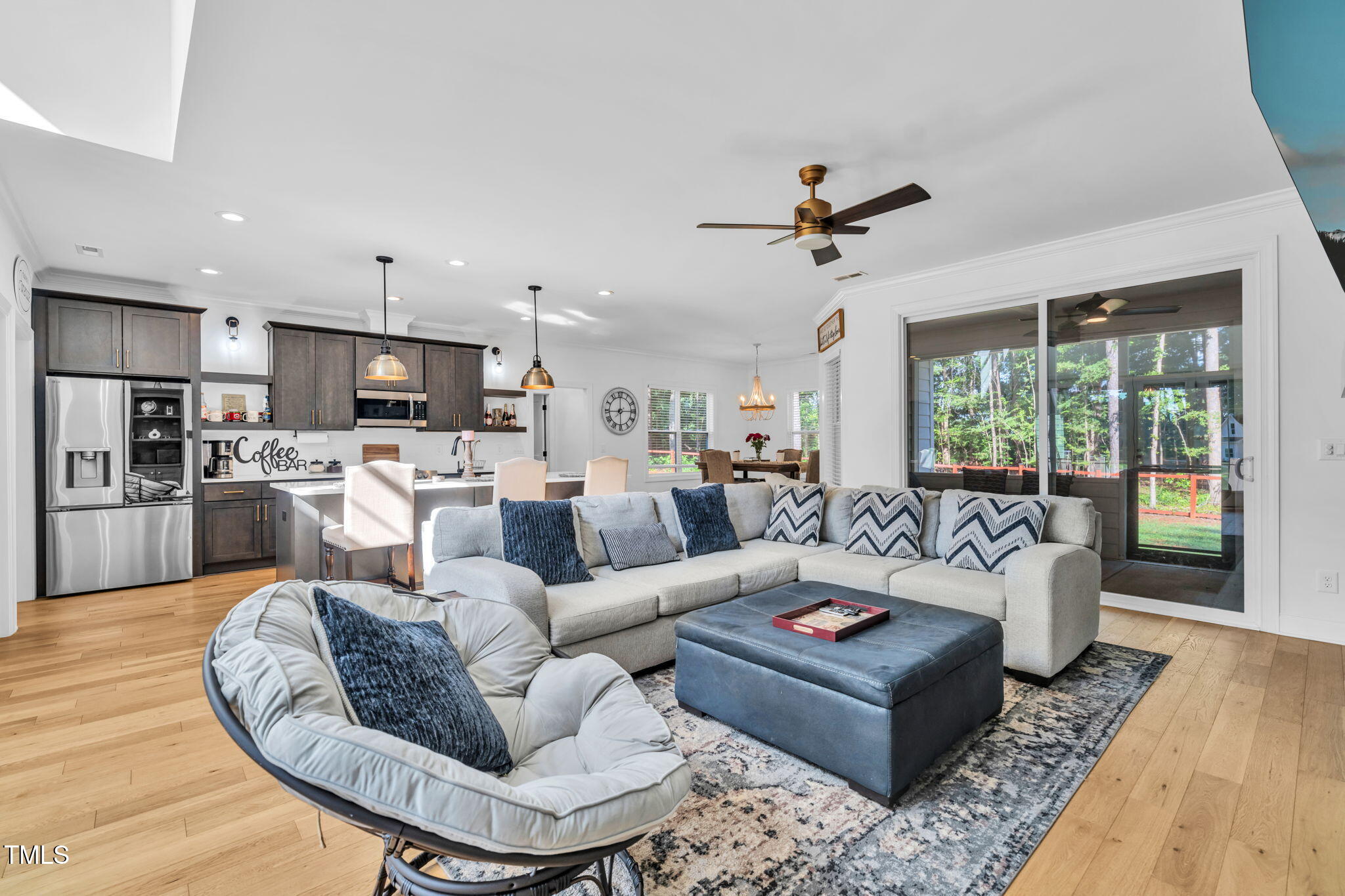 45 Tamaran Ct Spring Spring Hope, NC 27882 - Photo 8 of 35 a living room with furniture kitchen view and a chandelier