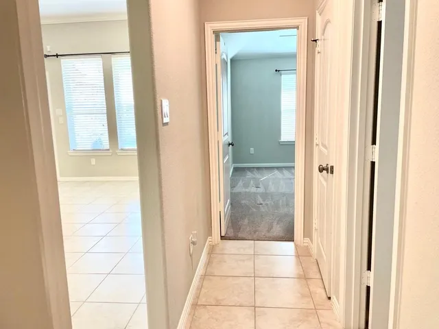 a bath tub sitting next to a shower
