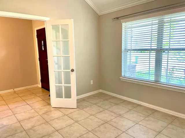 a view of a room with a window