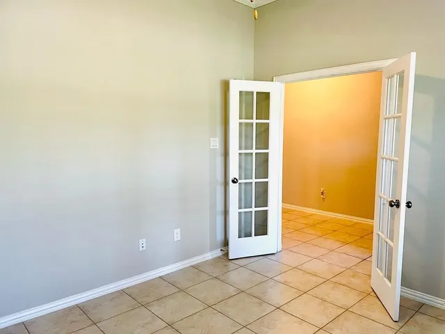 an empty room with windows